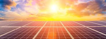 Solar array at sunset on open land